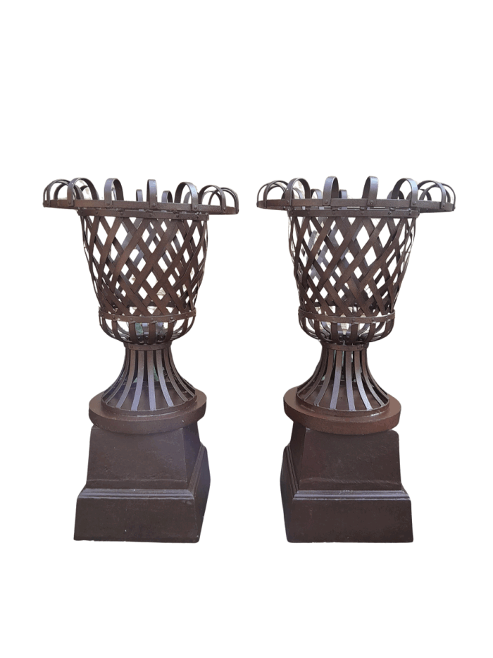 A 20th Century Pair of Decorative Wrought Iron Urns on Plinths
