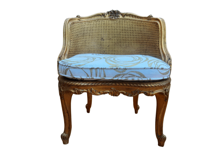 A 20th Century French Style Giltwood Rattan Chair Upholstered In Hand Printed Gold Design Fabric 