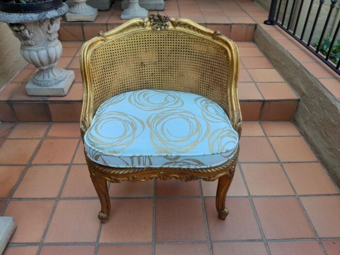 A 20th Century French Style Giltwood Rattan Chair Upholstered In Hand Printed Gold Design Fabric  - Image 2
