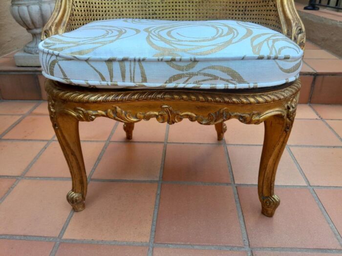 A 20th Century French Style Giltwood Rattan Chair Upholstered In Hand Printed Gold Design Fabric  - Image 4