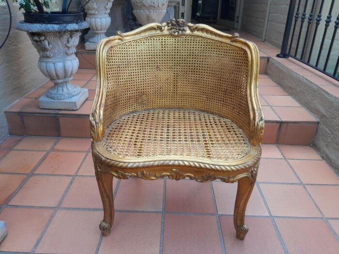 A 20th Century French Style Giltwood Rattan Chair Upholstered In Hand Printed Gold Design Fabric  - Image 6