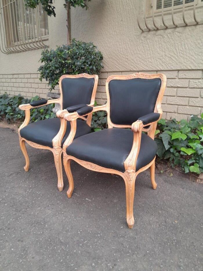 A 20th Century Pair of French Style Carved Fruitwood Armchairs in a Contemporary Bleached Finish and Upholstered in Leather - Image 6