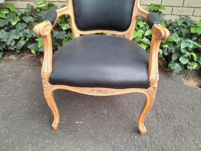 A 20th Century Pair of French Style Carved Fruitwood Armchairs in a Contemporary Bleached Finish and Upholstered in Leather - Image 9