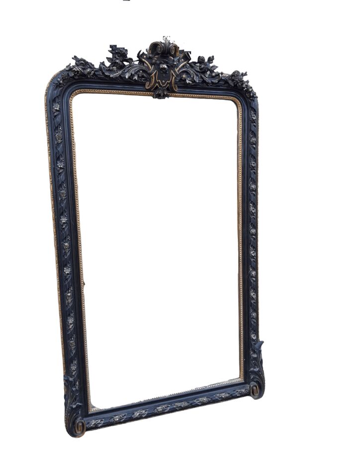 A 20th Century French Style Ebonized Hand-Gilt Ornate Mirror
