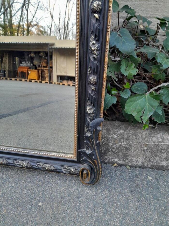 A 20th Century French Style Ebonized Hand-Gilt Ornate Mirror - Image 4