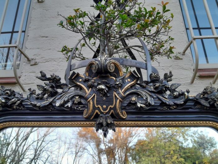 A 20th Century French Style Ebonized Hand-Gilt Ornate Mirror - Image 7