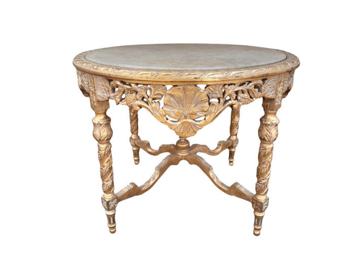 A French Style Ornately Carved and Gilded Wooden Table with Marble Top