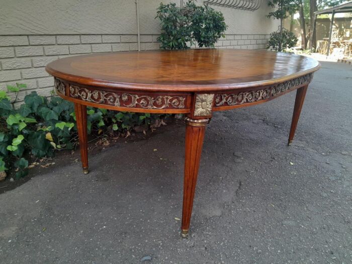 A 20th Century French Style Dining Table with Gold Detail - Image 6