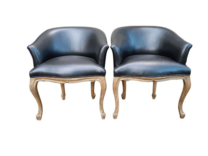 A French Style Pair of Carved Wooden and Hand-Gilded Tub Chairs Upholstered in Black Leather