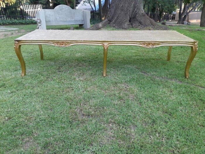 A 20th Century French Style Carved And Gilded Rattan Ottoman /  Bench With Seat Cushion In Hand Made Fabric - Image 4