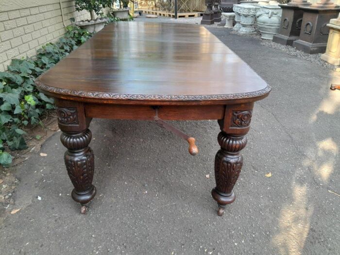 An Antique Victorian English Carved Oak Extending Dining Table on Castors and with Crank Handle - Image 6