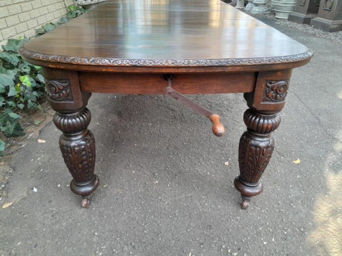 An Antique Victorian English Carved Oak Extending Dining Table on Castors and with Crank Handle - Image 7