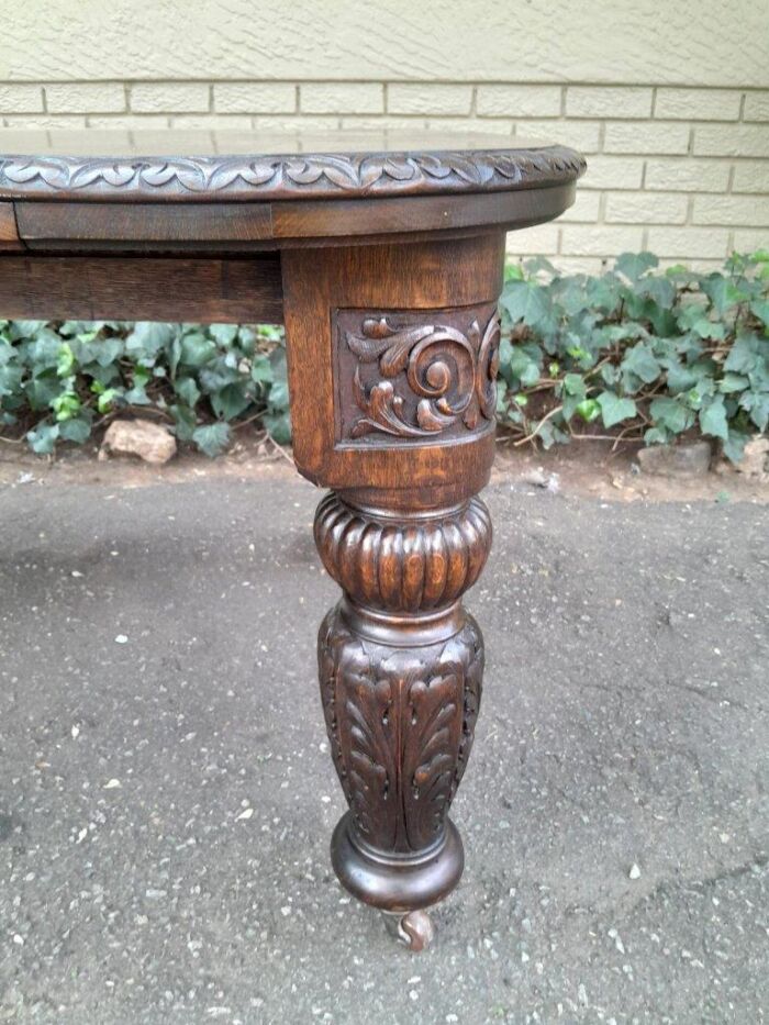 An Antique Victorian English Carved Oak Extending Dining Table on Castors and with Crank Handle - Image 10