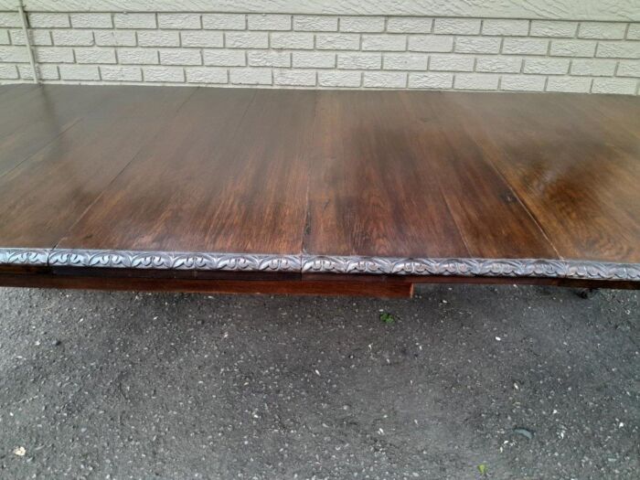 An Antique Victorian English Carved Oak Extending Dining Table on Castors and with Crank Handle - Image 11