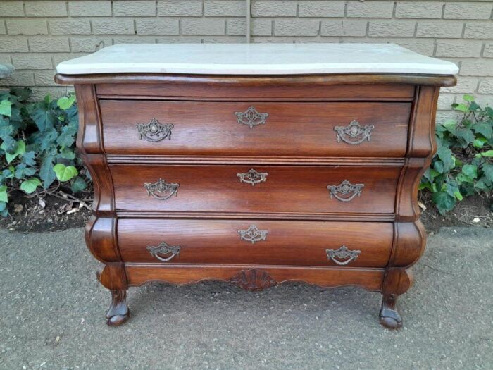 A 19th Century French Provincial Louis XVI-style Oakwood Bombe Chest of Drawers with Galala Cream Marble Top - Image 2