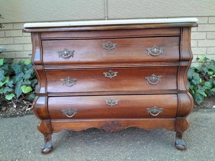 A 19th Century French Provincial Louis XVI-style Oakwood Bombe Chest of Drawers with Galala Cream Marble Top - Image 3