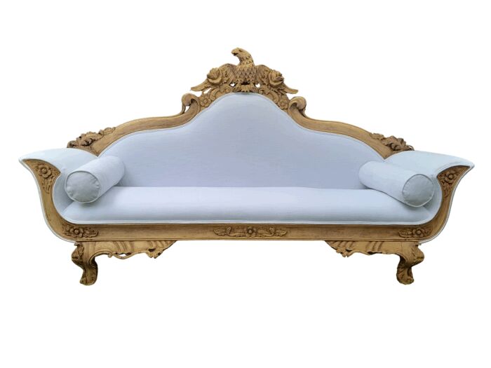 A 20th Century Ornately  Carved Eagle Settee In A Bleached Contemporary Finish Upholstered In A Slubby Linen