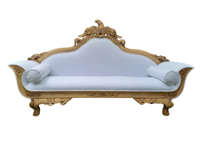 A 20th Century Ornately  Carved Eagle Settee In A Bleached Contemporary Finish Upholstered In A Slubby Linen