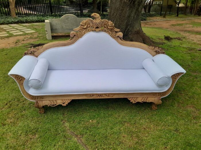 A 20th Century Ornately  Carved Eagle Settee In A Bleached Contemporary Finish Upholstered In A Slubby Linen - Image 2