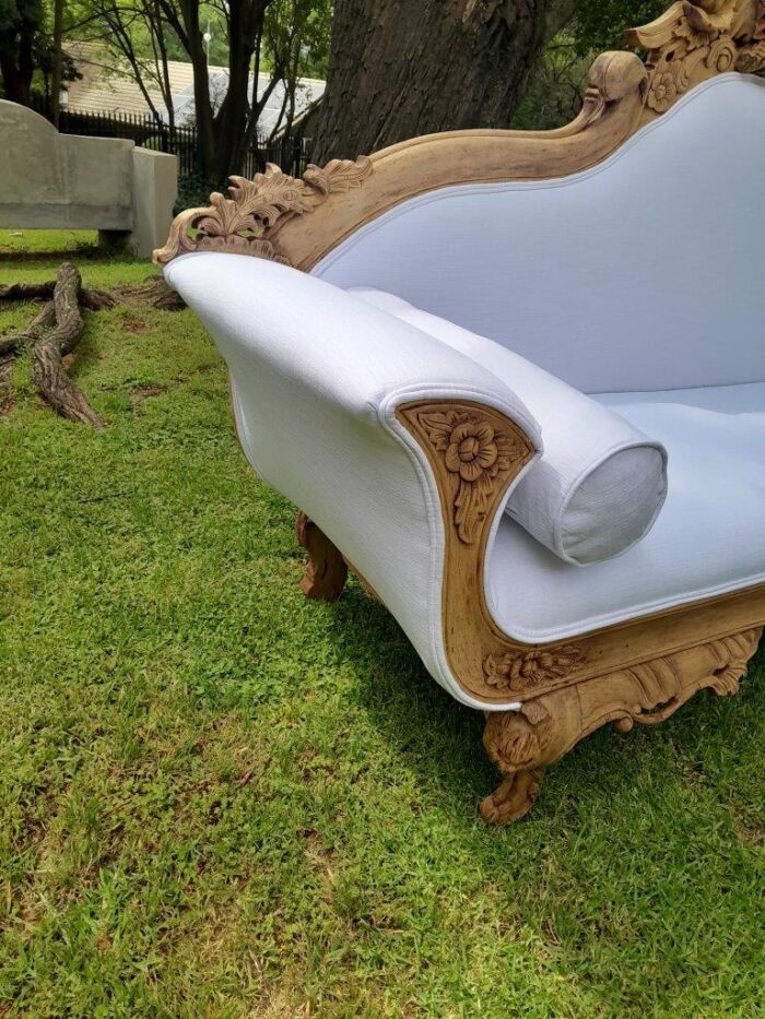 A 20th Century Ornately  Carved Eagle Settee In A Bleached Contemporary Finish Upholstered In A Slubby Linen - Image 4