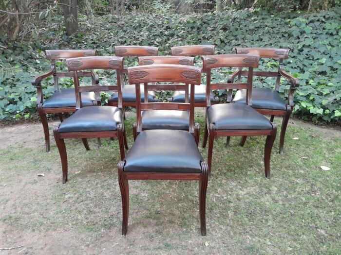 An Antique Late 18th / Early 19th Regency Set of Eight  Mahogany Dining Chairs Upholstered inleather. Comprising: A pair of Carvers and Six Side Chairs - Image 3