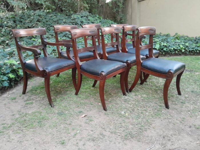 An Antique Late 18th / Early 19th Regency Set of Eight  Mahogany Dining Chairs Upholstered inleather. Comprising: A pair of Carvers and Six Side Chairs - Image 6