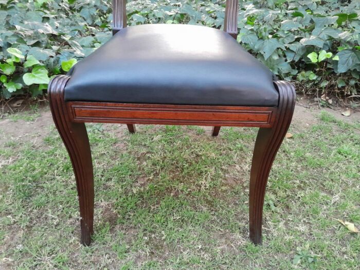 An Antique Late 18th / Early 19th Regency Set of Eight  Mahogany Dining Chairs Upholstered inleather. Comprising: A pair of Carvers and Six Side Chairs - Image 12