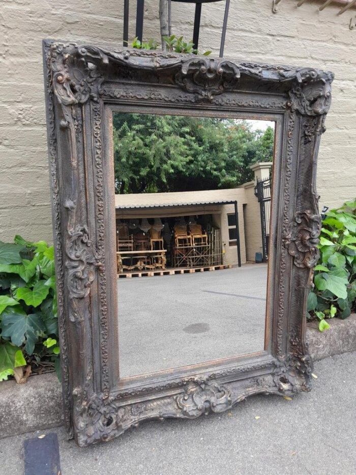 A 20th Century French Style Heavily Carved And Gilded Mirror - Image 2