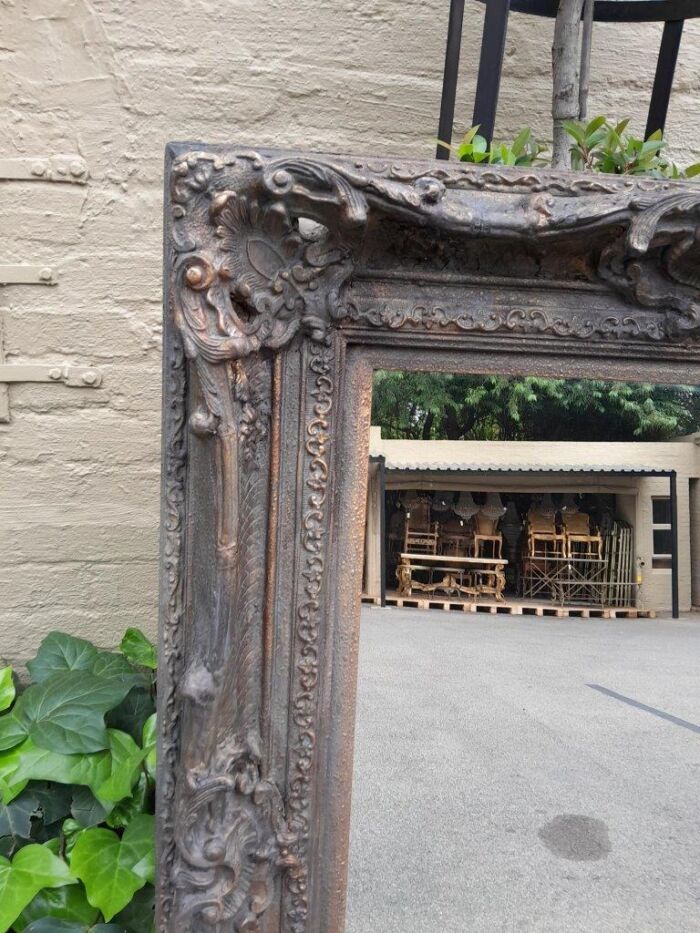 A 20th Century French Style Heavily Carved And Gilded Mirror - Image 4
