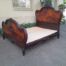 A 20th Century French Ornately Carved Rosewood Double Bed with Headboard
