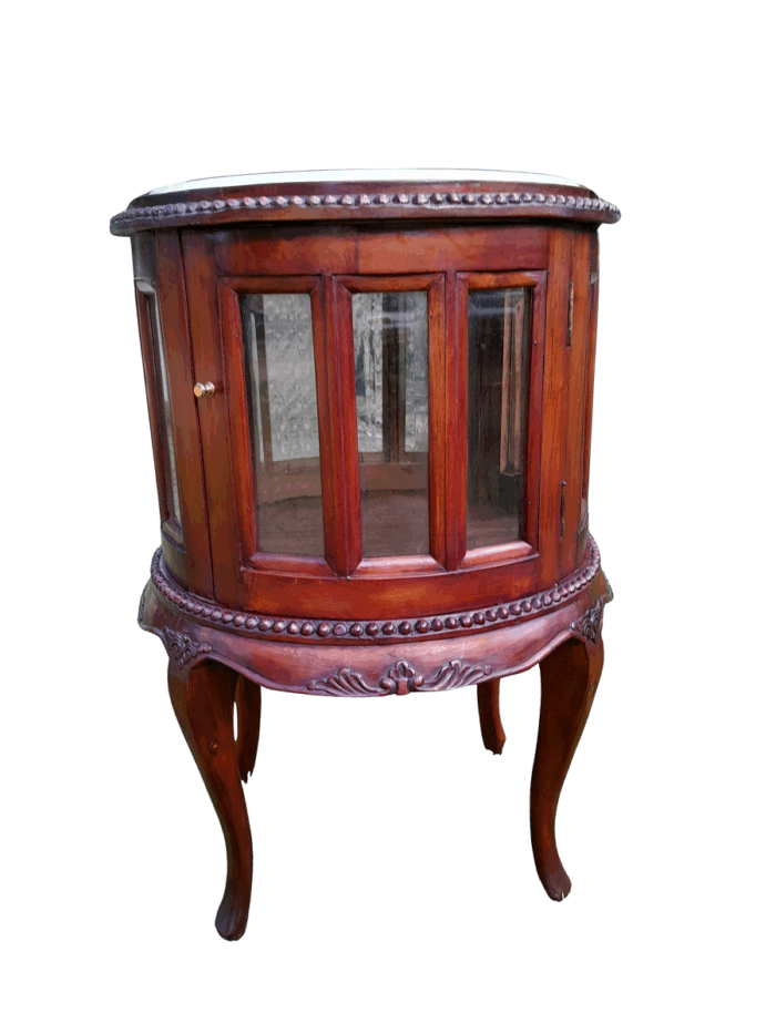 A 20th Century Victorian Ornately Carved Mahogany Drinkscabinet With Cream Marble Top