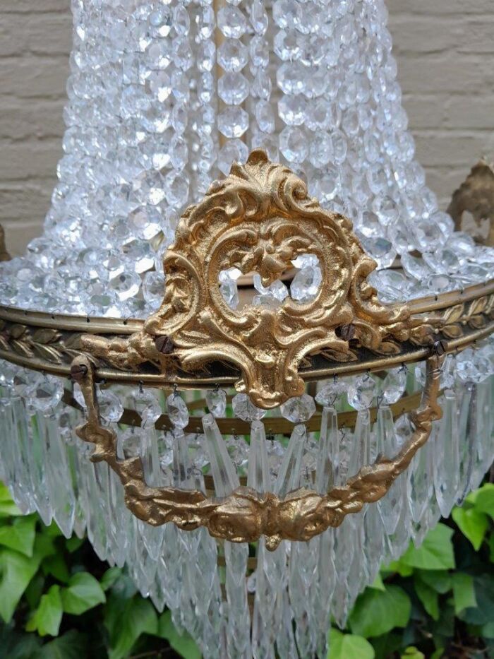 A 20th Century Empire French Style Brass And Crystal Chandelier - Image 5