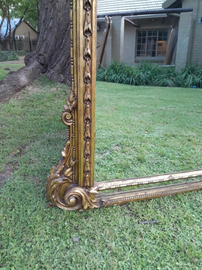 A French Style Ornately Carved And Gilded Bevelled Mirror Of Large Proportions - Image 4