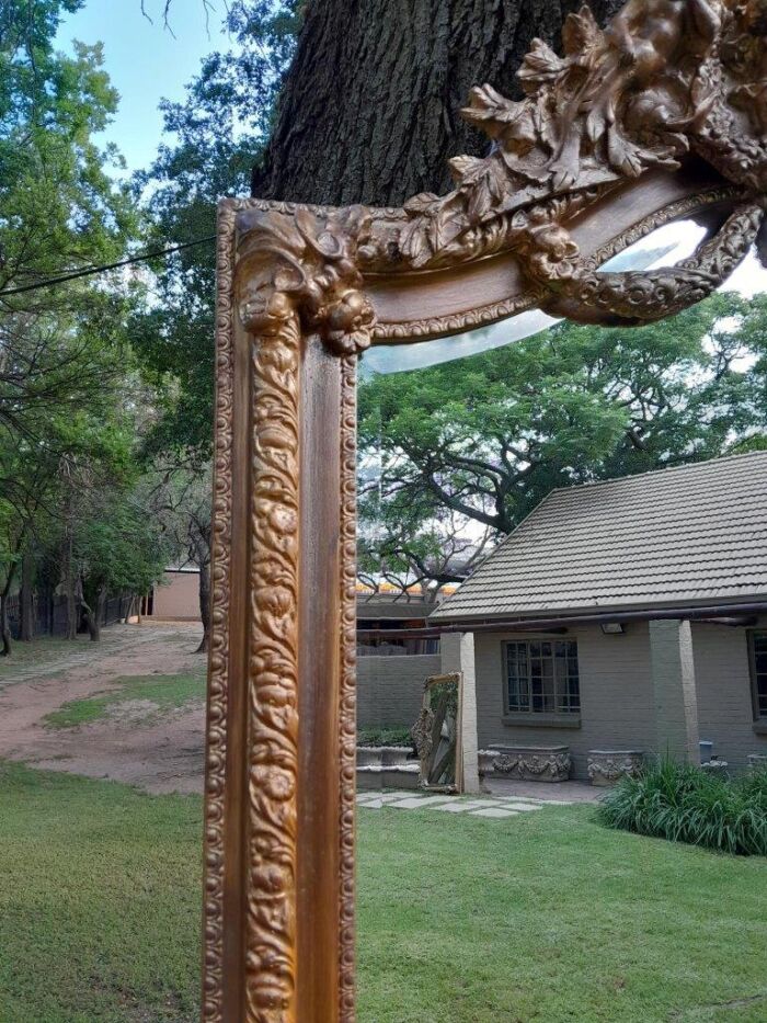 A French Rococo Style Ornately Carved And Gilded Bevelled Mirror - Image 4
