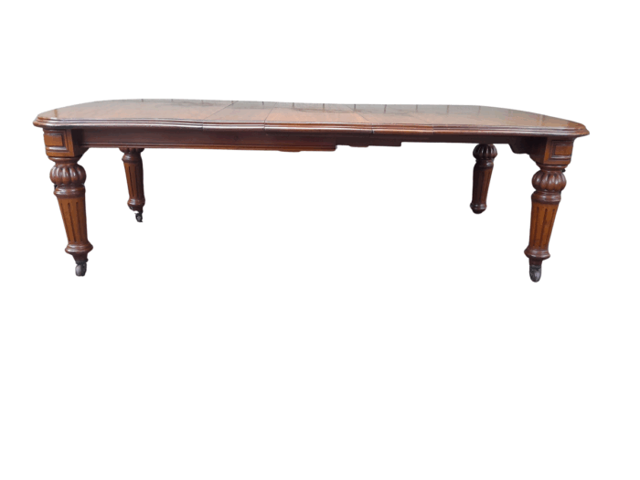 An Antique Victorian Mahogany Extension Dining Table With Original Porcelain Castors (Three Extensions)