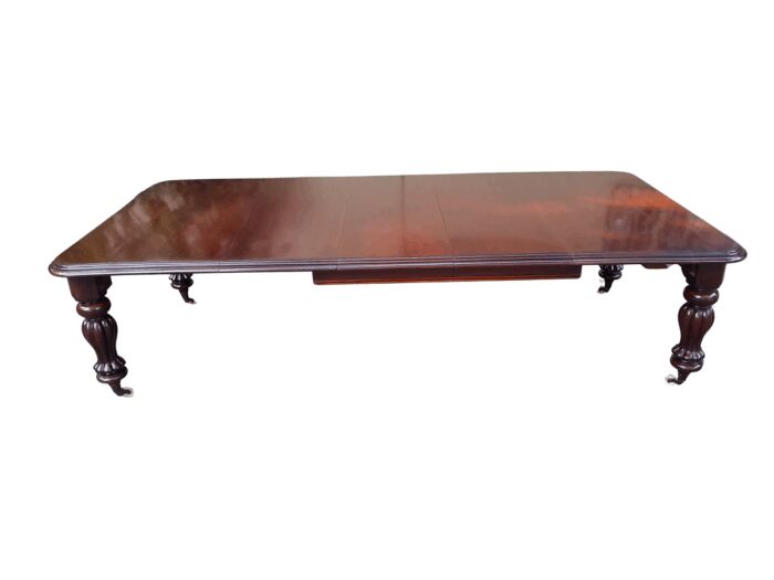 An Antique Victorian Mahogany Dining Table on Porcelain Castors with Three x Leaves and Crank Handle (10 Seater)