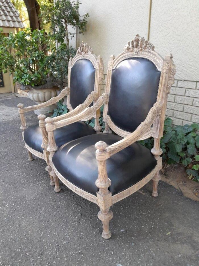 A 20TH Century French Style Ornately Carved Pair of  Oak Armchairs in a Contemporary Bleached Finish and Upholstered In Leather - Image 3
