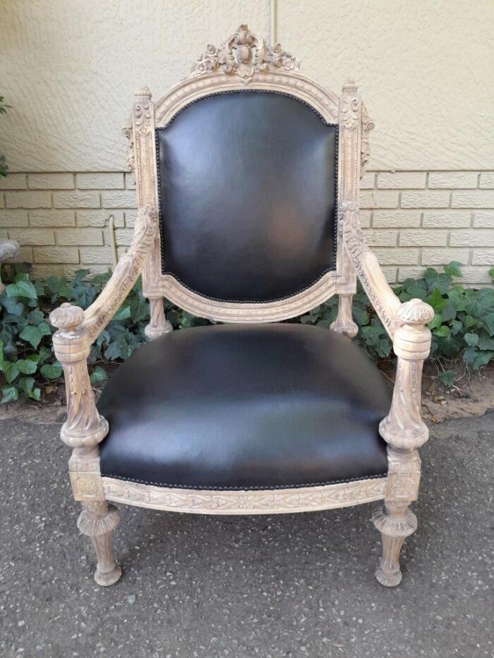 A 20TH Century French Style Ornately Carved Pair of  Oak Armchairs in a Contemporary Bleached Finish and Upholstered In Leather - Image 4