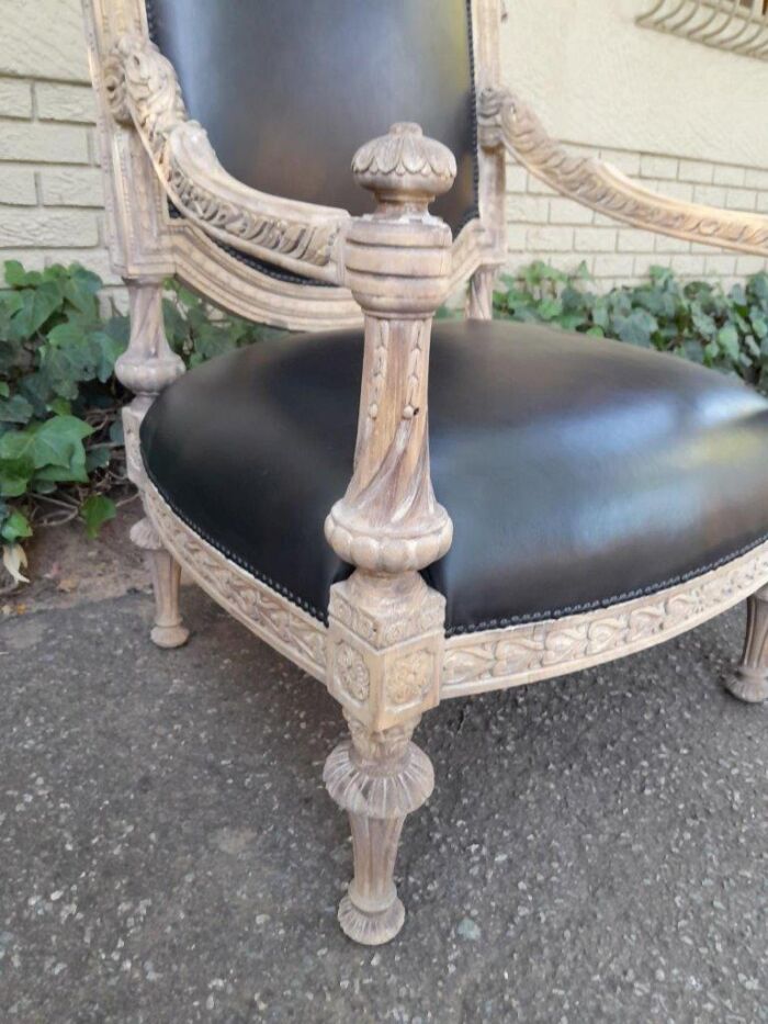 A 20TH Century French Style Ornately Carved Pair of  Oak Armchairs in a Contemporary Bleached Finish and Upholstered In Leather - Image 5
