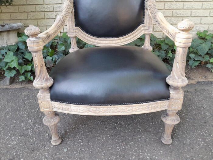 A 20TH Century French Style Ornately Carved Pair of  Oak Armchairs in a Contemporary Bleached Finish and Upholstered In Leather - Image 6