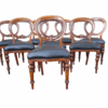 A 20th Century Set of Eight Victorian Style Mahogany Dining Chairs Upholstered in Leather