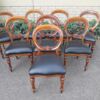 A 20th Century Set of Eight Victorian Style Mahogany Dining Chairs Upholstered in Leather - Image 2
