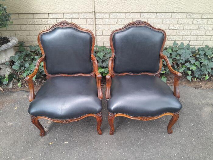 A 20th Century Pair or Carved Mahogany Armchairs Upholstered In Leather - Image 2