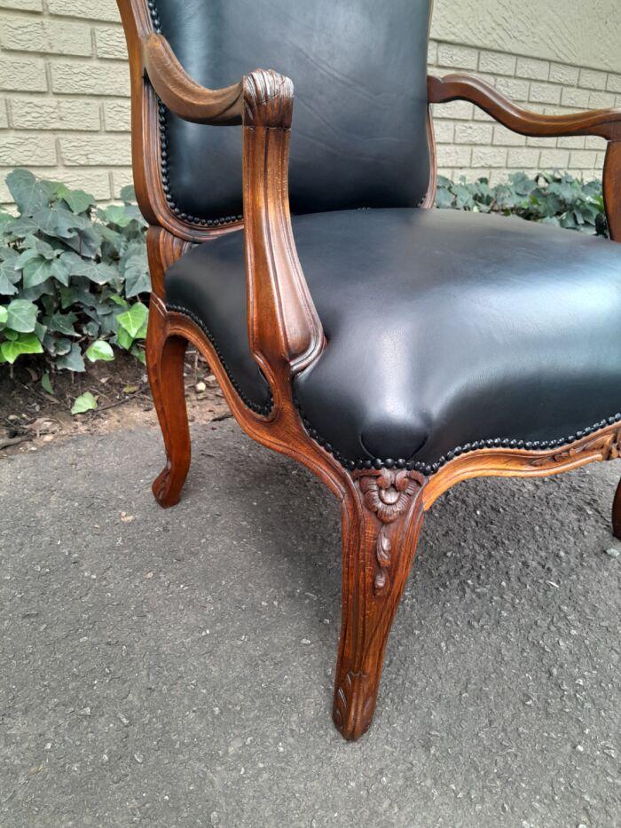 A 20th Century Pair or Carved Mahogany Armchairs Upholstered In Leather - Image 6