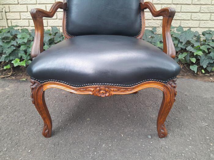 A 20th Century Pair or Carved Mahogany Armchairs Upholstered In Leather - Image 7
