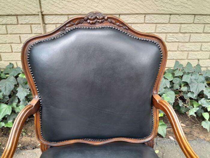 A 20th Century Pair or Carved Mahogany Armchairs Upholstered In Leather - Image 8