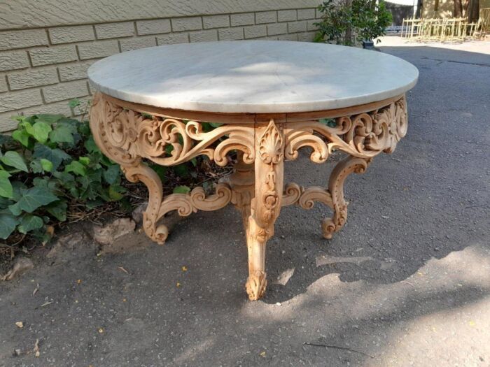 A20th Century Rococo Style Heavily Carved Teak Table with White Marble Top in a Contemporary Bleached Finish - Image 4