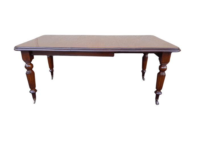 A 20th Century Victorian Style Mahogany Extending Dining Table Seats 8 on Brass Castors