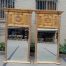 A 20th Century Pair of French Empire Style Giltwood Bevelled Mirrors
