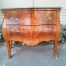 An Antique French Louis XV Style Rrosewood and Marquetry Bombe / Chest of Drawers with Marble Top and Gilt Metal Mounts